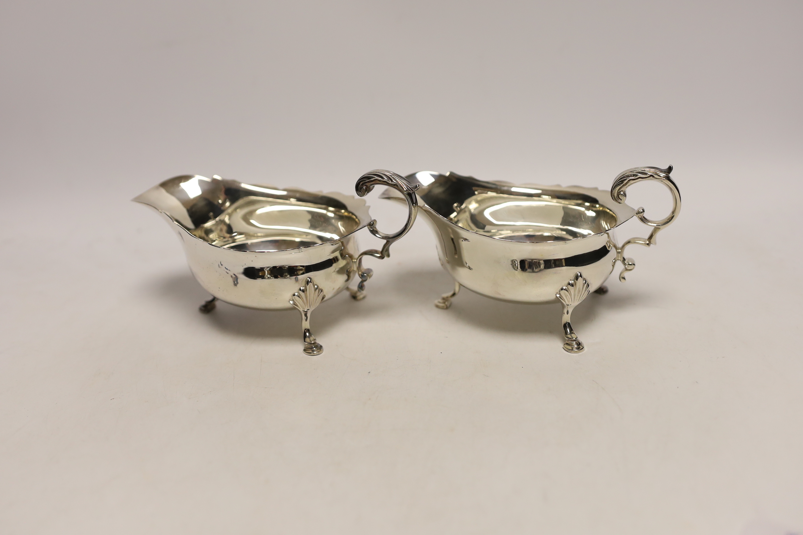 A modern pair of silver sauceboats, C.J. Vander Ltd, Sheffield, 1990, length 15.2cm, 9.7oz.